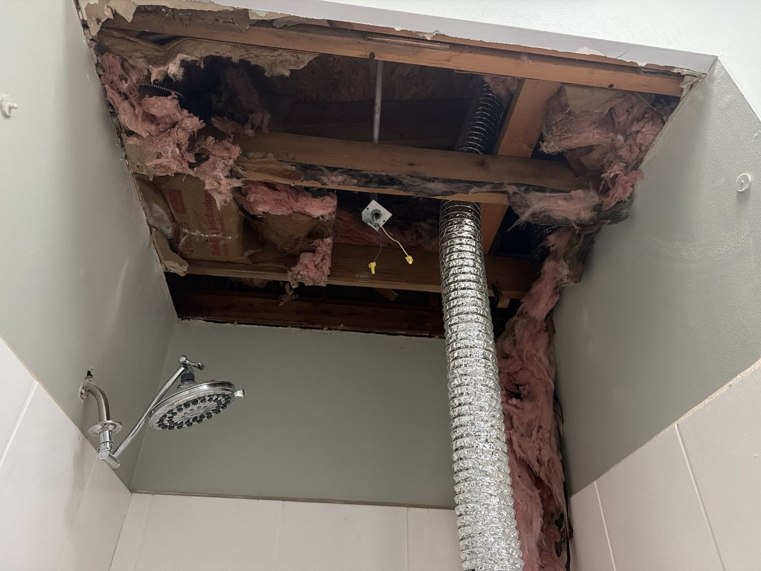Bathroom ceiling opened during repair